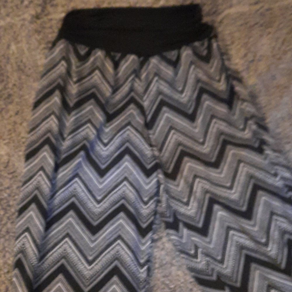 Patterned long pants.